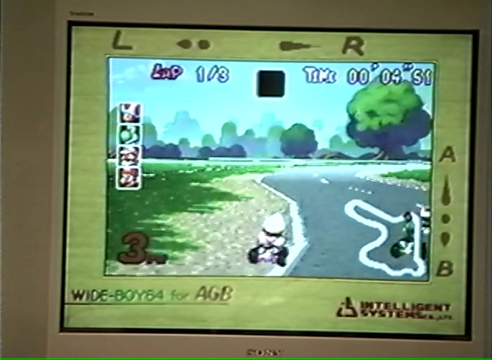 Mario Kart is demoed on the Game Boy Advance using a Wide Boy 64.